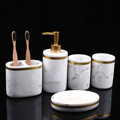 Marble Soap Dispenser – "Luxury marble soap dispenser with gold accents"
