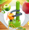 Electric vegetable peeler slicing carrots in a kitchen