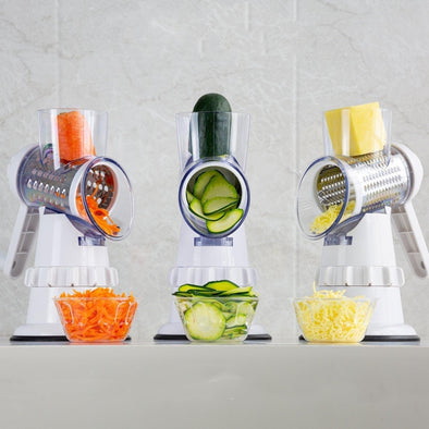 Manual food chopper with diced vegetables in a bowl.
