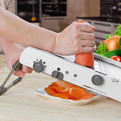 Durable kitchen cutter with interchangeable blades